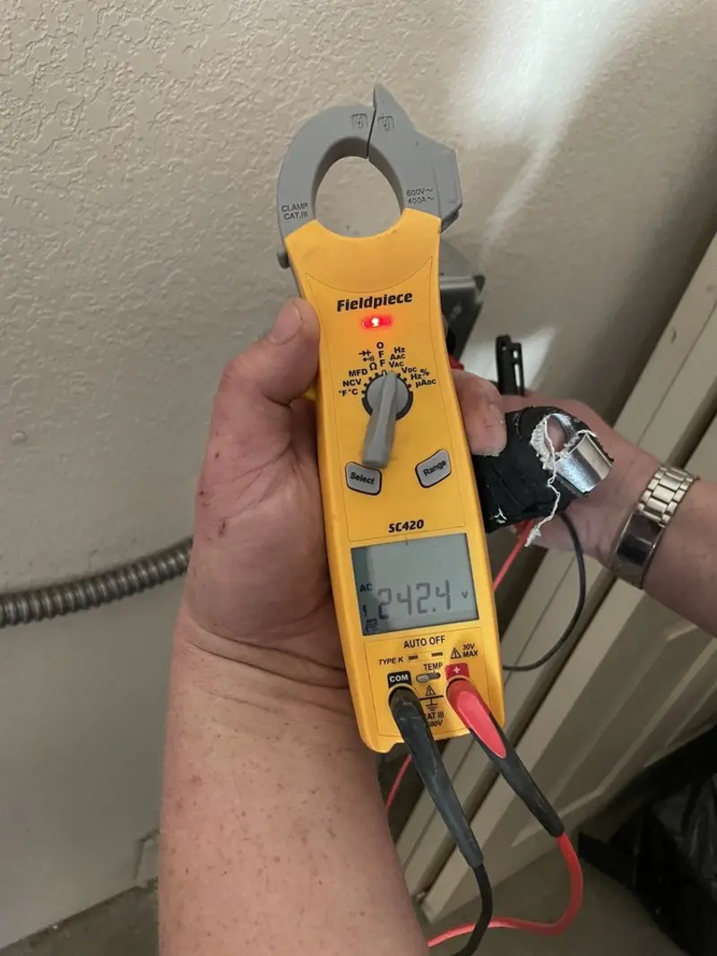 Voltage testing with clamp meter during Ceiling Fan Installation in Lehighton